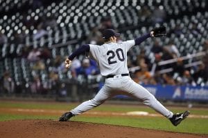 Pitcher winding up his throw