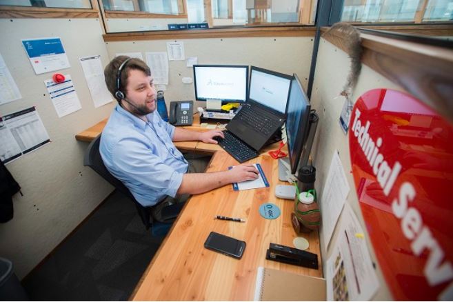 Tech Support Staff at desk