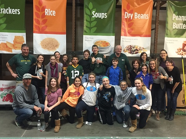 Group volunteering for Feed America in Milwaukee, WI