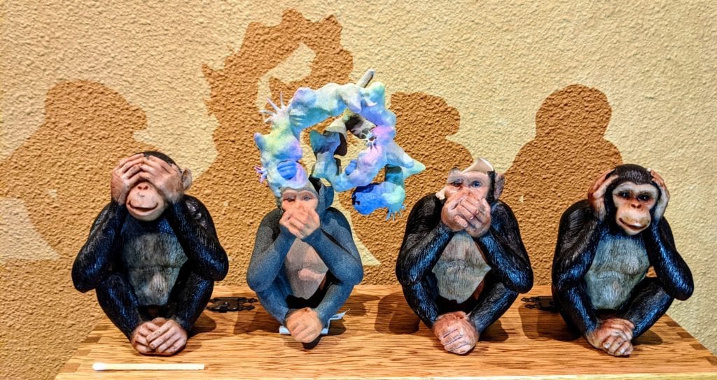 4 Monkey Figurines in the 'Hear No, See No, Speak No Evil' Style