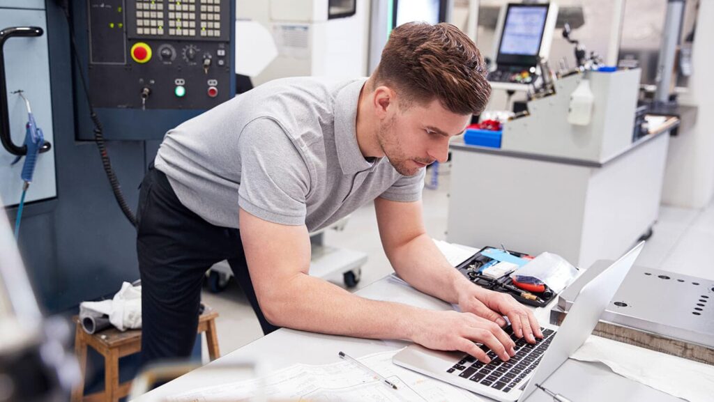 Man using computer software